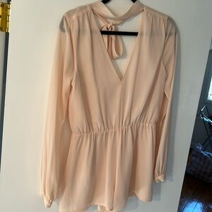 Lovers + Friends ballet slipper pink sheer long sleeve romper with open back